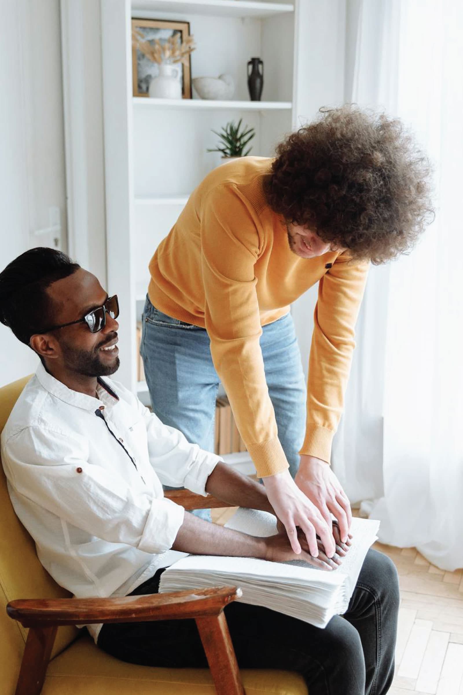 Caregiver supporting a participant using a wheelchair