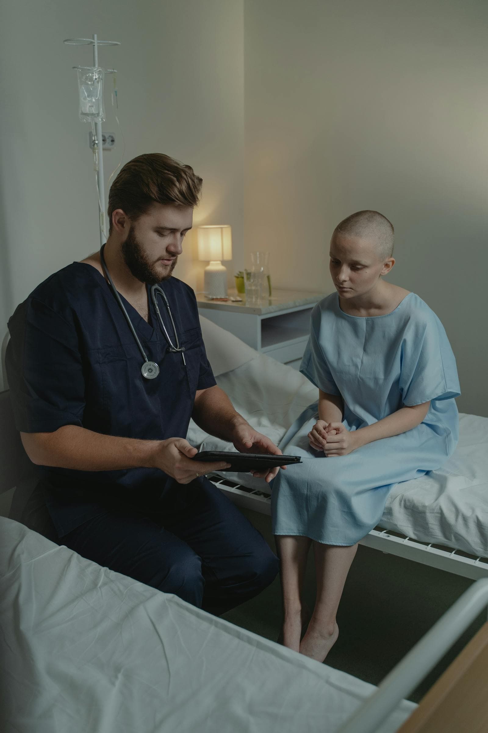 Healthcare professional speaking with a patient